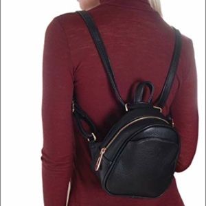 Small black leather backpack